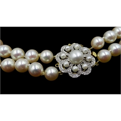 Double strand cultured pearl necklace, with 18ct gold diamond and pearl set clasp hallmarked