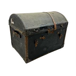 Early 20th century travel trunk, domed top with leather straps and metal rivet detailing, wooden frame with black canvas covering, interior lined with striped fabric, manufacturers mark to the inside 