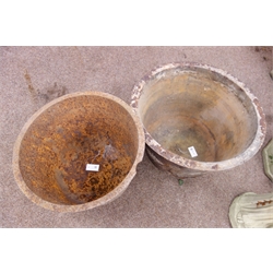  Two Victorian cast iron cylindrical sett pots, D62cm, H48cm (maximum)  