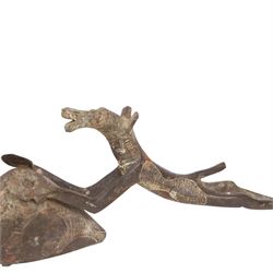 Early anthropometric bronze, possibly African, modelled as a dog holding urn, L20cm