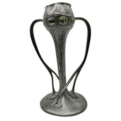 Archibald Knox (1864-1933) for Liberty & Co, Tudric pewter tulip vase, with green cabochons decorating a bulbous bowl upon a tapering stem leading to a spreading foot issuing twin tendril handles that rise to meet the bowl, stamped beneath 029, H24cm