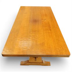 Beaverman - oak adzed top refectory table, the rectangular top raised on twin trestle supports with shaped feet united by a stretcher, the joints secured with exposed pegs, with carved beaver signature, by Colin Almack of Sutton near Thirsk