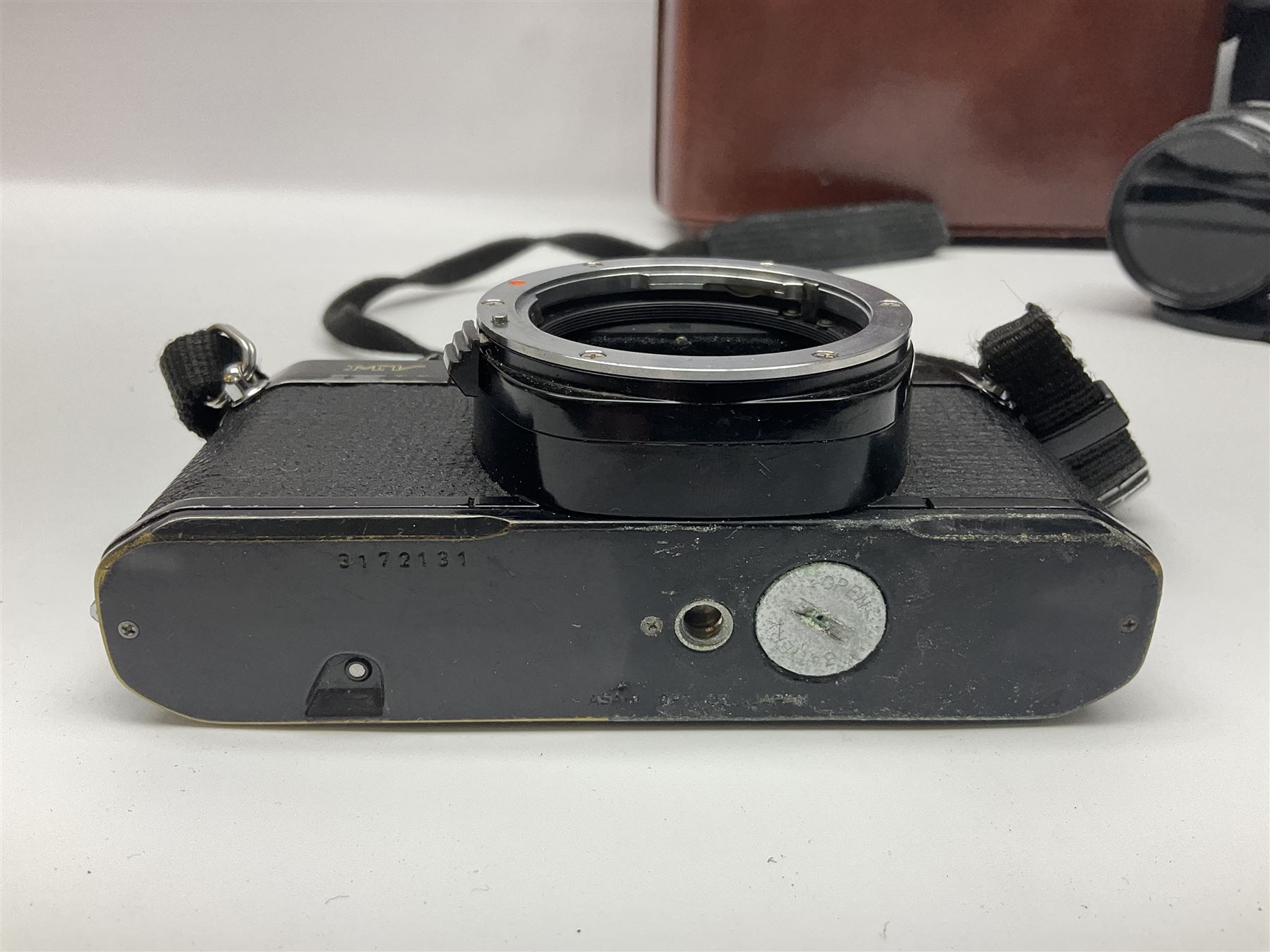 Four Minolta camera bodies, to include Dynax 500si, serial no. 94812651 with 'Signa Zoom 1;3.5-4.5 f=28-70mm' lens, Maxxum 300si, serial no. 97821665, with 'Tamron AF 80-210mm' lens and Dynax 300si, serial no 01603265'  with Minolta AF Power Zoom 35-80mm 1;4' lens, etc, together with Pantax MV1 camera bodies and other camera equipment 