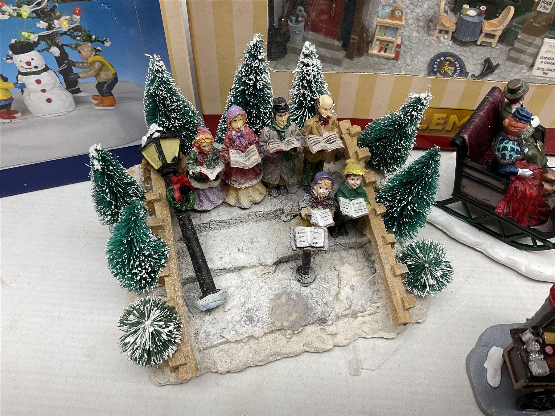 Christmas decorations; Lamax light up English Lane wall hanging, together with Lemax Frolic in the snow, Victorian parkway and other christmas signs and figures