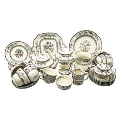 Spode 'Chinese Rose' pattern part tea service comprising two teapots, twin handled lidded sucrier, six teacups and saucers, four larger teacups and saucers, five bowls, milk jug and sugar bowl, mug, six side plates, cake plate and another circular serving plate, all with printed marks beneath