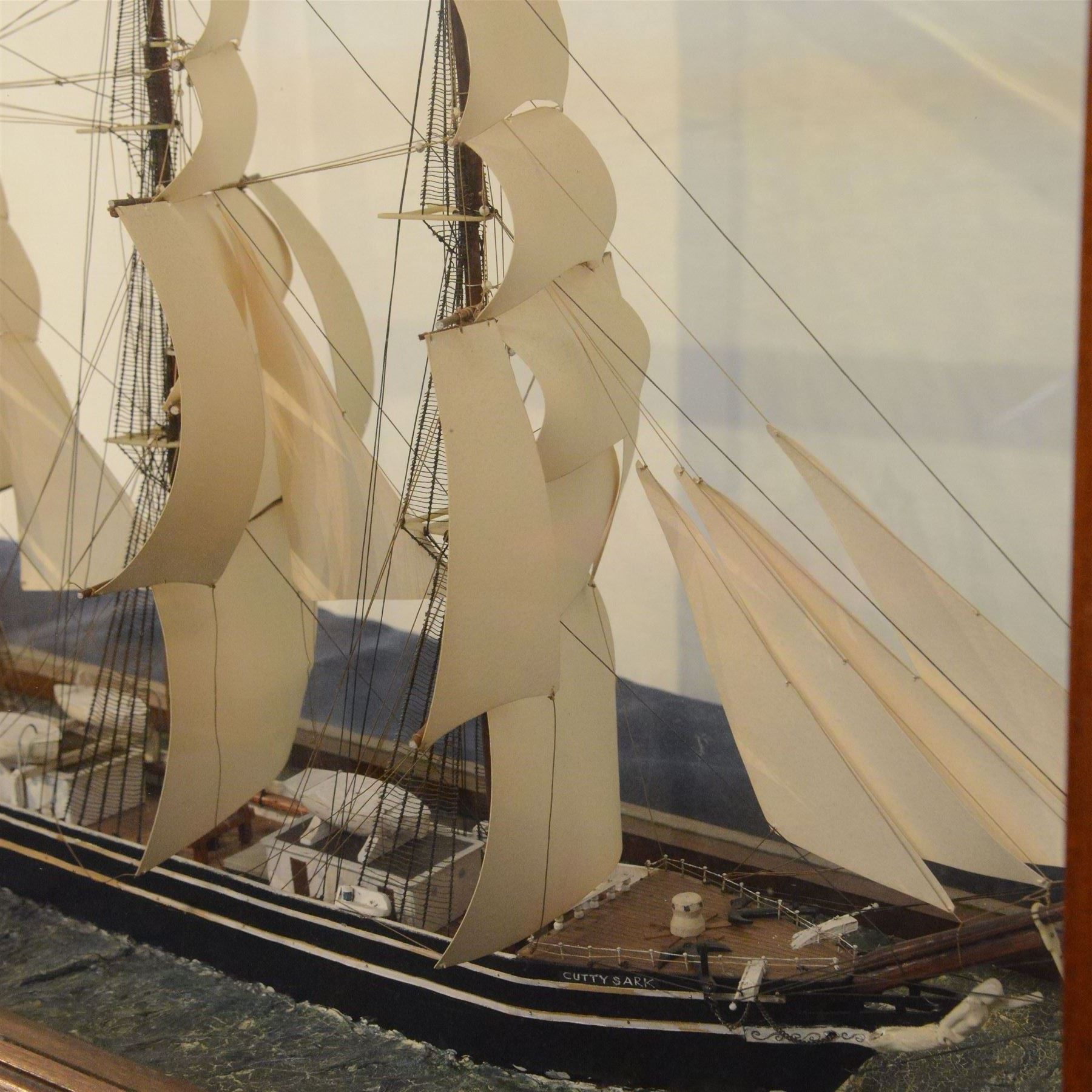 Early 20th century fully rigged waterline model of the Cutty Sark, contained within a glazed wooden case, case H54.5cm