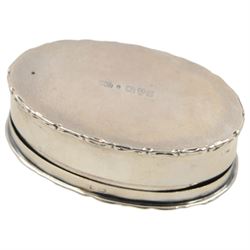 Edwardian silver trinket box, of oval form with embossed scroll rim, the hinged cover inset with a jasperware roundel depicting a classical scene, hallmarked Cohen & Charles, Chester 1905, H2.5cm, W7.5cm