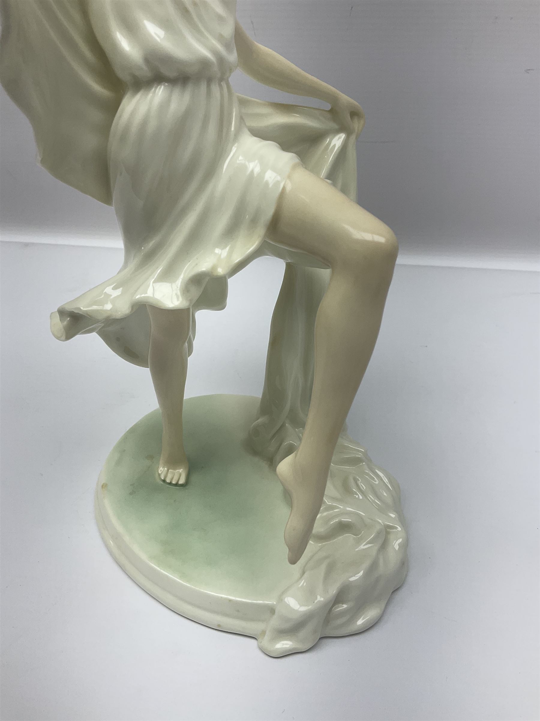 Two Royal Worcester figures, comprising Spirit of the Millennium and Spring, together with Royal Dux figure of two lovers