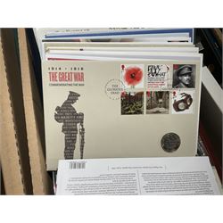 Approximately one hundred and fifteen Royal Mint coin covers, in two ring binder folders and loose, together with approximately 53 grams of Great British pre-1920 and approximately 68 grams of Great British pre-1947 silver threepence coins, and a small quantity of further pre-decimal coins