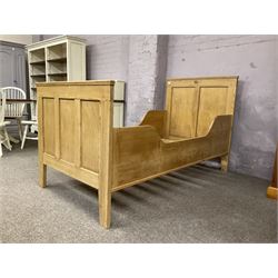 Early 20th century French polished pine 3’ single bedstead, panelled head and footboard