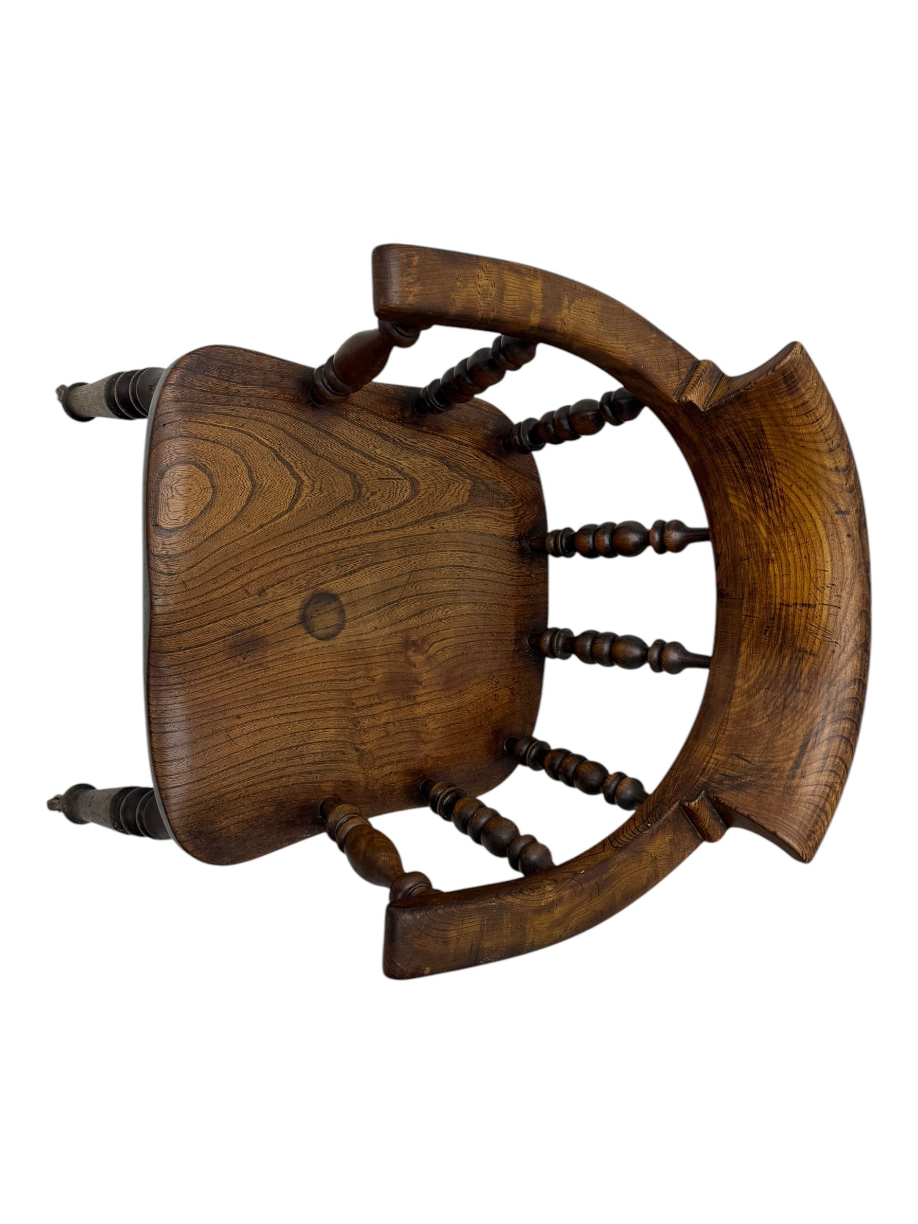 Victorian elm captains smokers bow chair, spindle turned tub shaped back, saddle seat, seat height 41cm