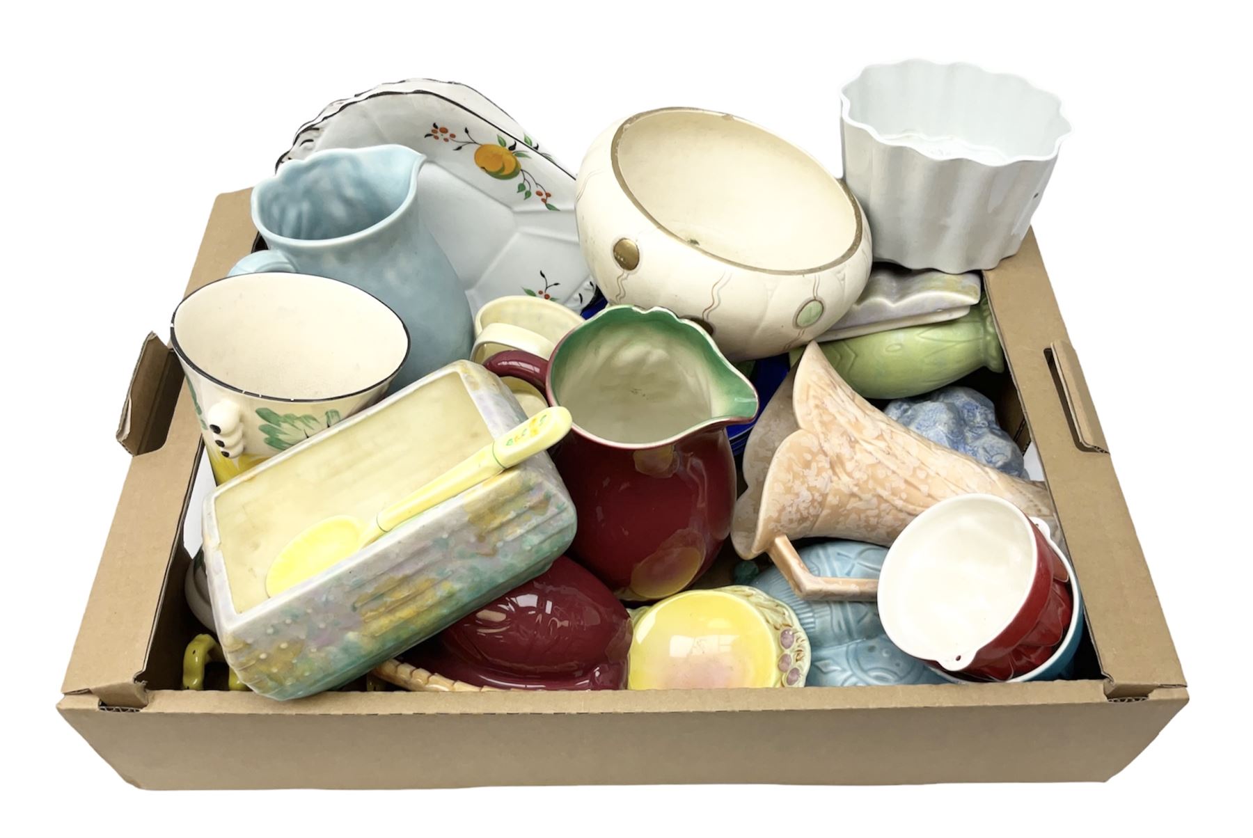 Two Beswick jugs decorated with palm trees, together with matching wall pockets, and similar ceramics, together with six Shelley dishes  