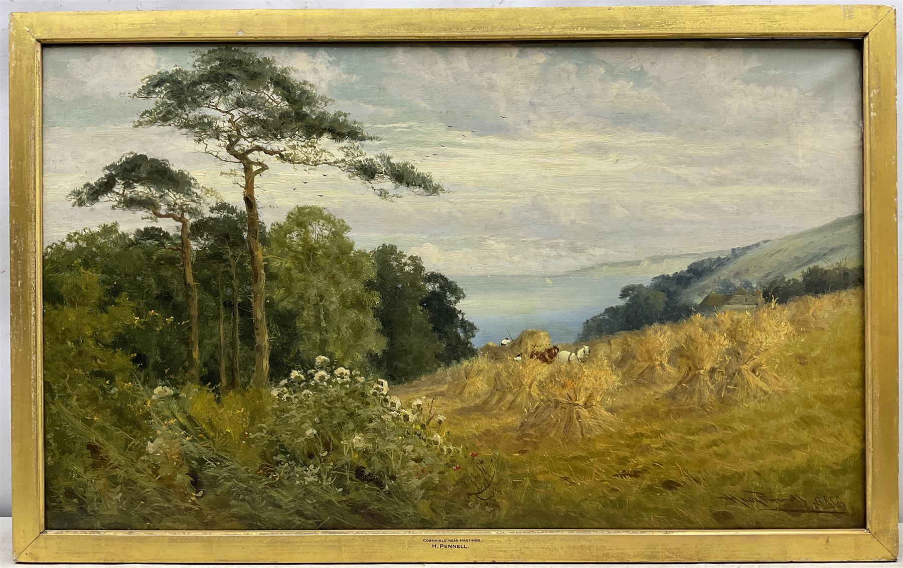 Harry Pennell (British 1879-1934): 'Cornfield near Hastings', oil on canvas signed, titled on the slip, further inscribed verso 60cm x 101cm 
