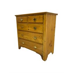 19th century polished pine chest, fitted with two short and three long drawers, with pressed brass handle plates