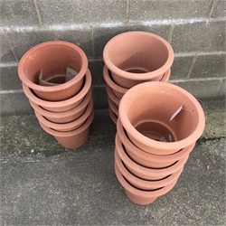 Fifteen tapering terracotta pots, H31cm