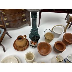 Collection of miniature dolls house furniture and accessories, to include long case clock, chest of drawers, tiled wash stand, ceramics and glass ware, mirror, baskets, etc 