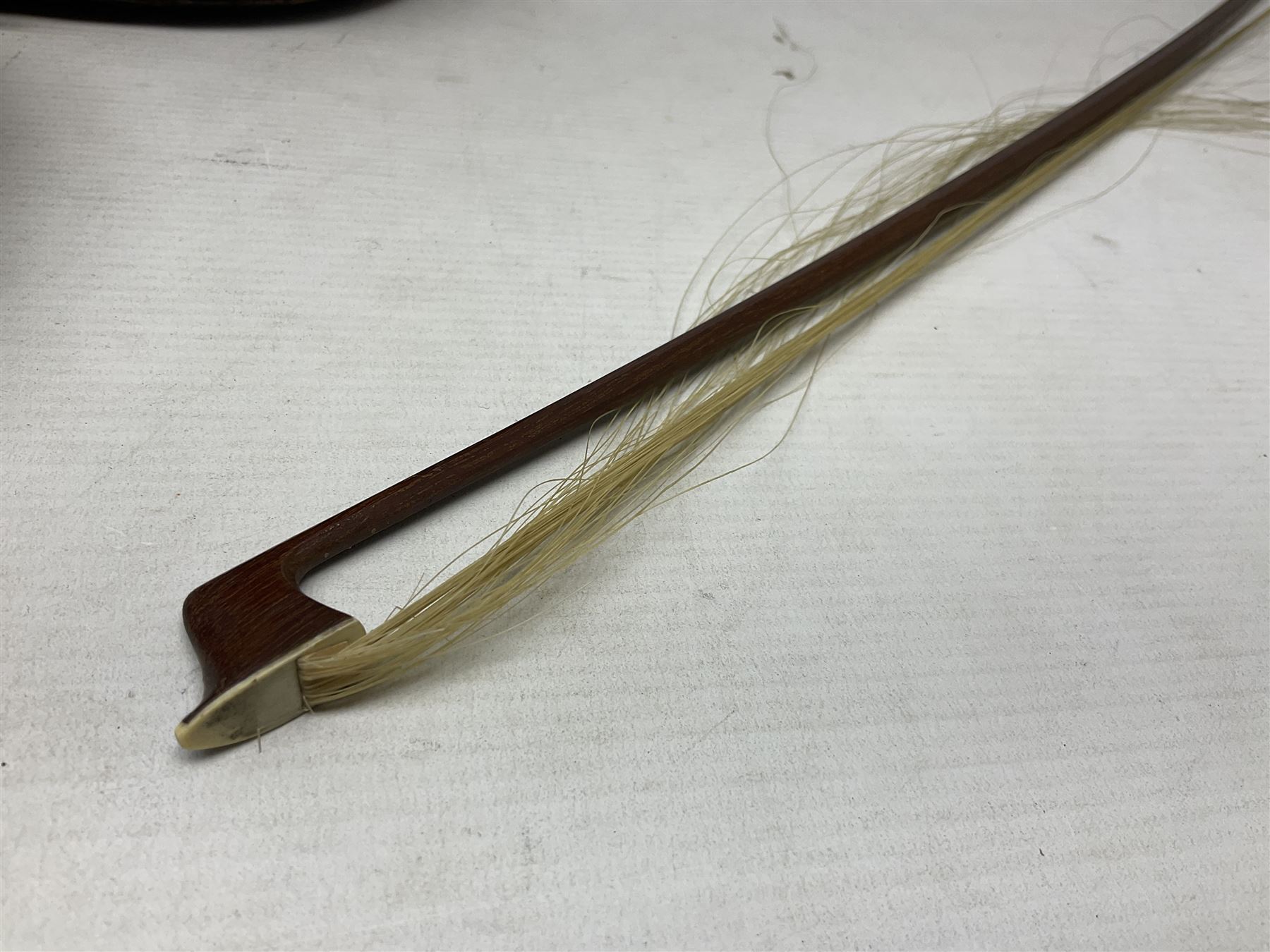 German trade violin 1950s with 36cm two-piece maple back and ribs and spruce top, bears label 'Johann Stainer in Absam prope Oenipontum 1650' L59cm; in carrying case with bow impressed Tourte