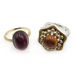  Silver citrine flower ring with 18ct detail by Pamela Dickinson and a 9ct gold cabachon garnet ring  