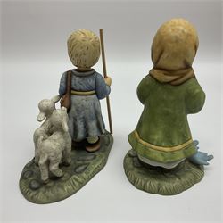 Eight Christmas Hummel figures by Goebel, to include Wintertime Chapel candle holder, Winter Fun, Christmas Morning, Christmas Time and Gingerbread Lane, tallest H21cm