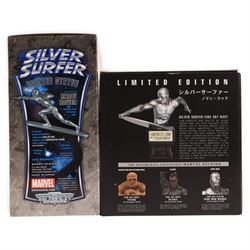 Bowen Designs Silver Surfer painted statue, together with a Kotobukiya Collection Marvel Studios Silver Surfer Fine Art Bust, both boxed