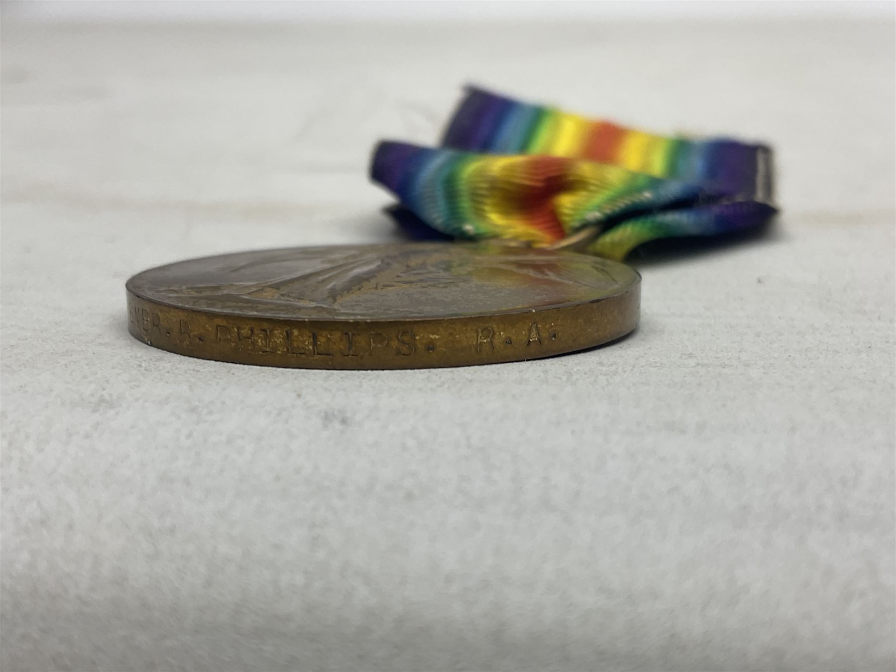 WW1 pair of medals comprising British War Medal and 1914-15 Star awarded to 1440 Pte. J. Wood Lan. Fus.; and WW1 Victory Medal awarded to 12128 Bmbr. R. Phillips R.A.; all with ribbons (3)