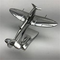 Set of three aluminium planes with rotating propellers, tallest H18cm