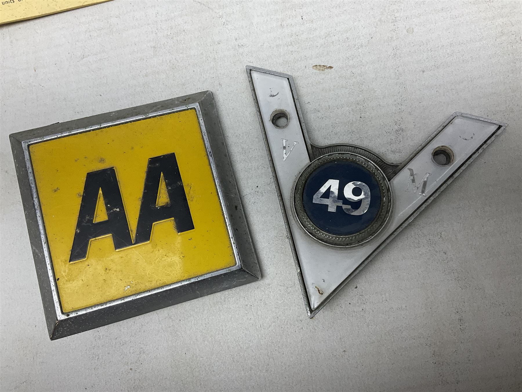 Gold plated leaping Jaguar car mascot, no.7'24265'3WB L12.5cm; three AA car badges and Veteran Motorists car badge; and quantity of 1950s fuel and general ration books