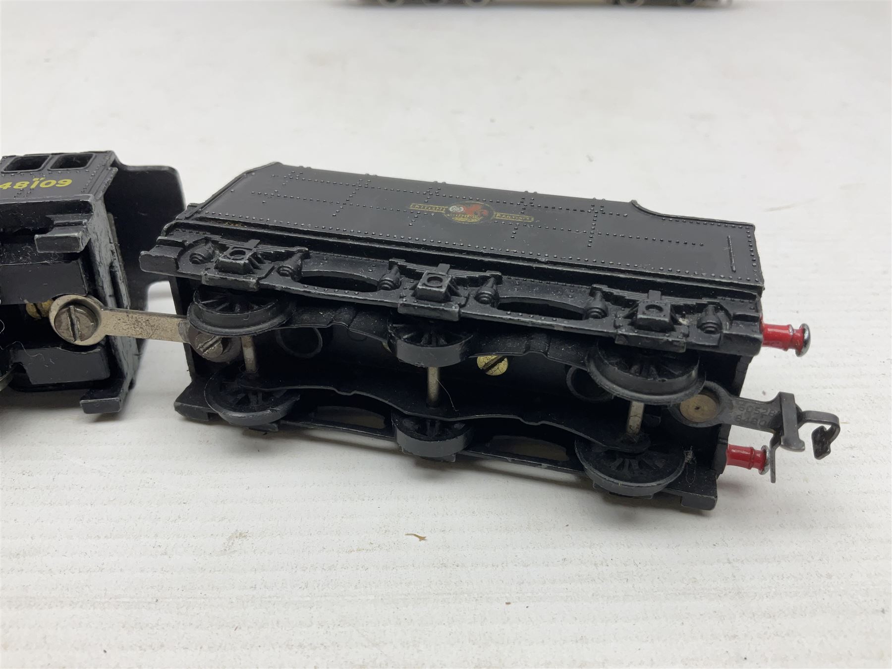 Hornby Dublo - 2-rail - Class 8F 2-8-0 locomotive No.48109 in BR black; Class R1 0-6-0 tank locomotive No.31337 in BR black; and Met-Vic Diesel Co-Bo locomotive No.D5702 in BR green; together with 3-rail Class 4MT Standard Tank 2-6-4 locomotive No.80054 in BR black; three unassociated boxes and one unboxed (4)