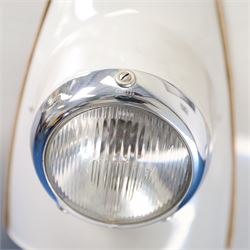 1957 Zündapp Bella R154 Scooter

• Registration: 150 KPU
• Year: 1957
• Model: Bella R154
• Engine: 150cc two-stroke single-cylinder petrol
• Transmission: Four-speed manual
• Odometer reading: 1,727 miles
• Colour: Ivory
• Seating: Dual seat
• V5C: Present
• Original registration book: Present
• Keys: 1

A characterful 1957 Zündapp Bella R154 scooter, finished in ivory with a contrasting brown dual seat and displaying an odometer reading of 1,727 miles.

The Bella R154 formed part of Zündapp’s distinctive range of German touring scooters, combining a 150cc air-cooled two-stroke engine with four-speed transmission, large wheels and substantial pressed-steel bodywork. This example retains its enclosed front apron, central headlamp, chrome handlebars, brightwork, period VDO speedometer and decorative Bella badging.

An operation and maintenance manual is include and accompanied by its V5C and original registration book from 1957.

This vehicle forms part of the Estate of the Late John Sills and is offered for sale by the Executors, confirming a genuine reason for sale.