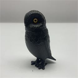 Novelty pewter pepper shaker in the form of an owl with screw off head and glass eyes