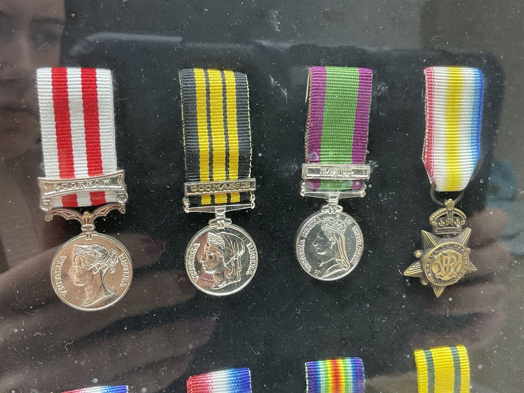 Limited edition large framed display board with sixty half-size copies of British Gallantry and Campaign Medals produced by Danbury Mint; all with ribbons and associated booklet