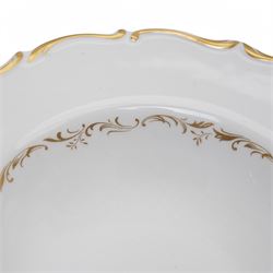 Royal Doulton dinner service in the 'Richelieu' pattern, comprising eleven dinner plates, twenty one dessert plates, twelve soup bowls, eleven dessert bowls, four vegetable dishes, oval serving dishes and graduating meat plates 