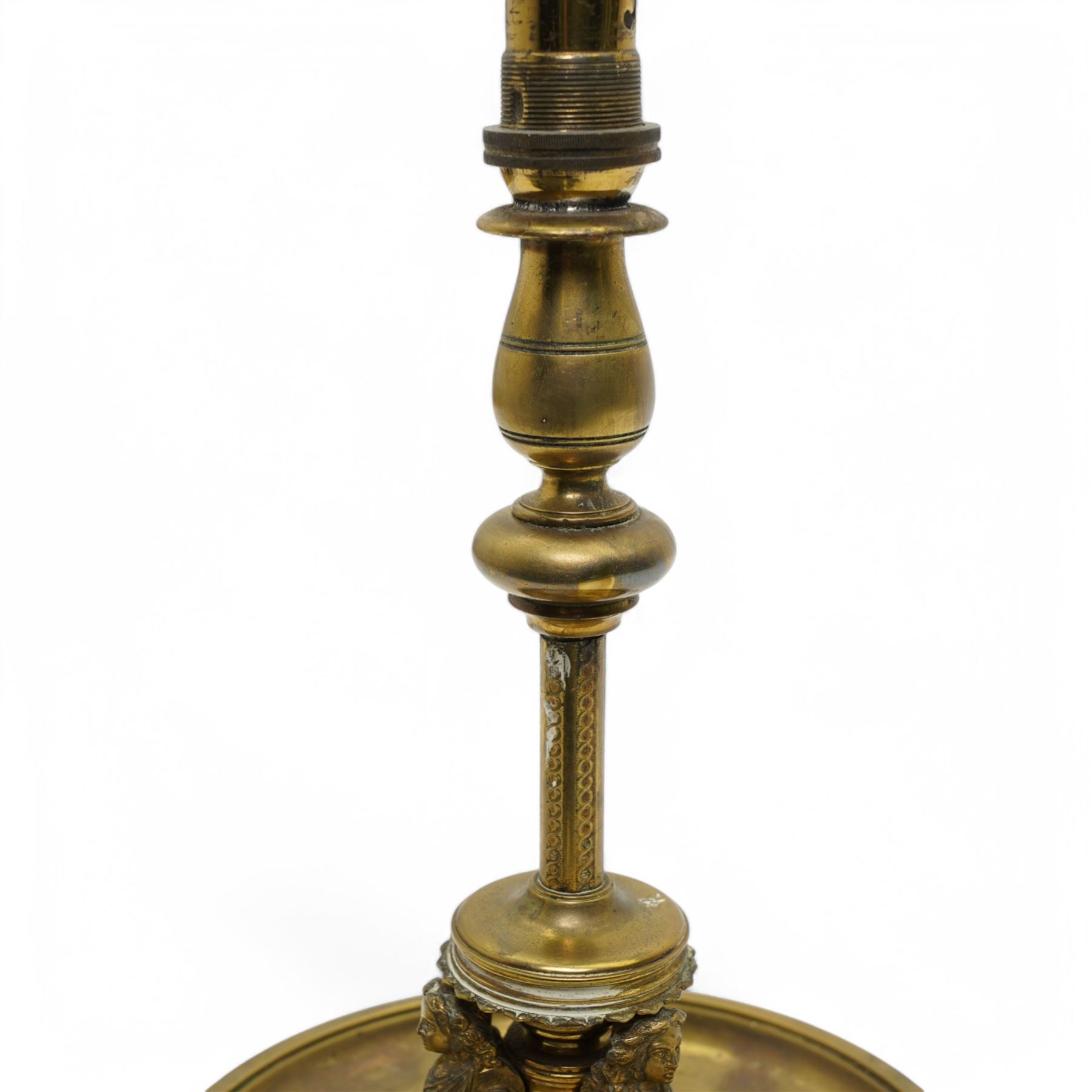Brass table lamp, of antique design with classical figures on a circular base, H29cm