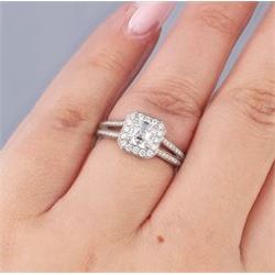 Platinum diamond cluster ring, the principal asscher cut diamond of 1.01 carat, with HRD report, colour F, clarity VS1, with round brilliant cut diamond surround and diamond set shoulders, hallmarked, total diamond weight 1.34 carat