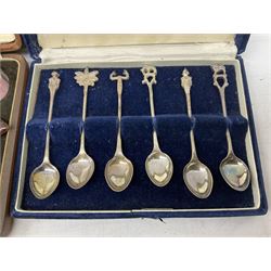 Cased manicure set with silver mounted accessories and covers to jars, together with a silver souvenir spoon, the terminal detailed 'Whitby', and a group of Eastern metal ware, including a set of six napkin rings, and set of six coffee spoons, etc.