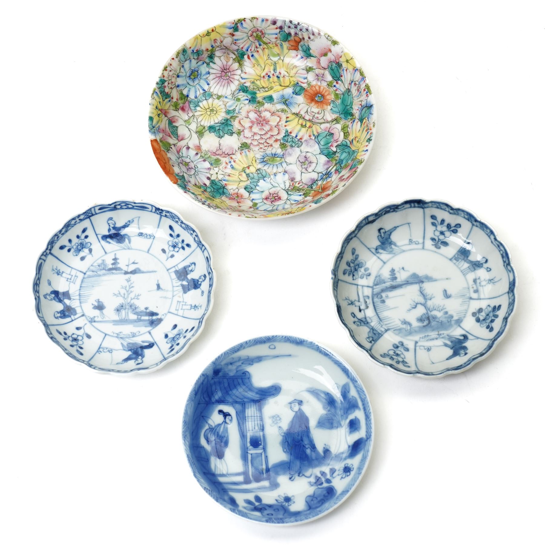 Pair of Chinese Kangxi period blue and white lobed dishes decorated with panels of fishermen, and another painted with a traditional scene, unmarked, D11.5cm; together with a Chinese millefleur dish, painted externally with bats, apocryphal Qianlong marks in red to base, D14.5cm (4)