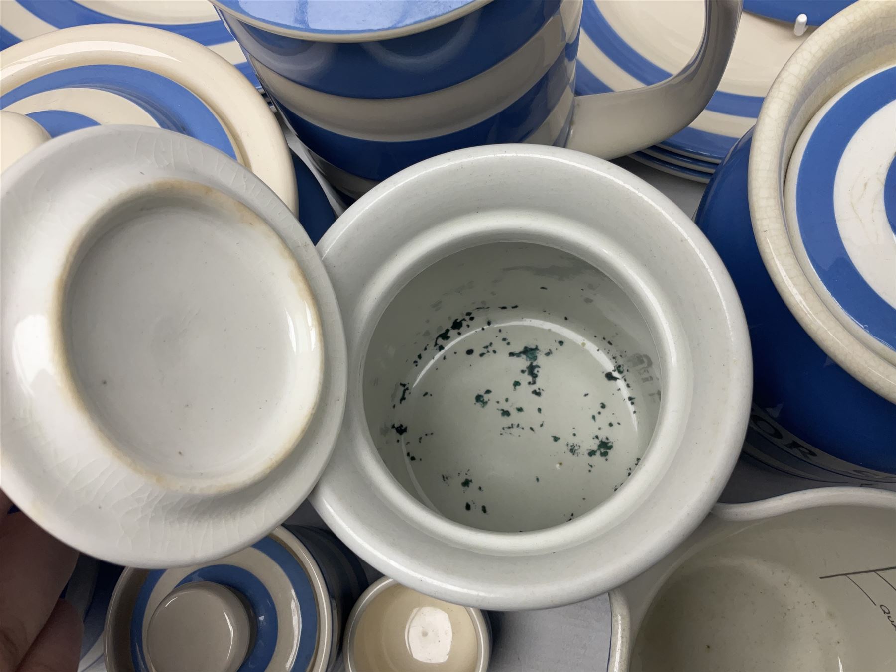 TG Green Cornish kitchen ware, to include coffee pot, pint milk jug, nine storage jars for various items, four dinner plates, etc (25)