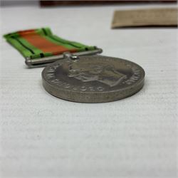 WWII Home Guard Service certificate to Albert John Pullinger with WWII Defence Medal; fretworked wooden Home Guard picture frame, image size 19 x 24cm; and WWII Civil Defence at Beverley (Yorks.) folding street plan (4)