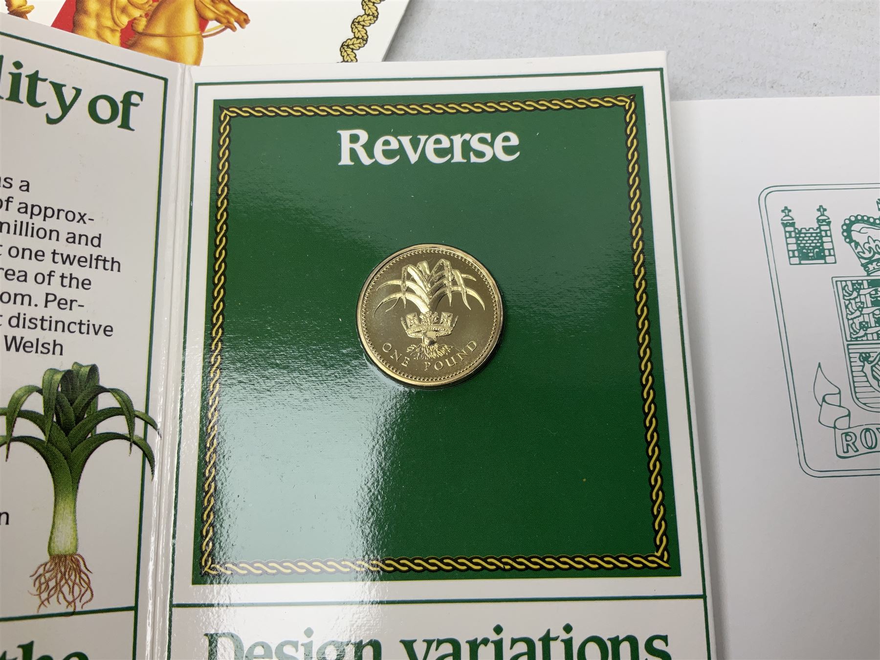 Two Great Britain and Northern Island proof sets dated 1970 and 1971, both with card cases, three 1986 Commonwealth Games commemorative two pound coins, in card folders, and six brilliant uncirculated one pound coins, in card folders