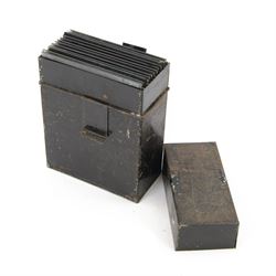 Collection of eleven plate glass negatives, depicting buildings, within a metal case 