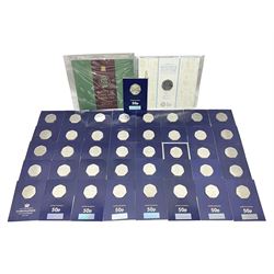 Mostly United Kingdom Queen Elizabeth II commemorative fifty pence coins, including 2019 'Gruffalo', 2020 'Iguanodon', 2022 'The Queen's Jubilee' etc, housed on cards, face value of UK coins approximately 20 GBP