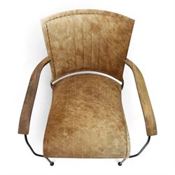 Mid century style cocktail cowhide chair, upholstered in tan cowhide, rectangular back and curved seat with stitched panels and laced borders, shaped wooden armrests on curved black metal supports 