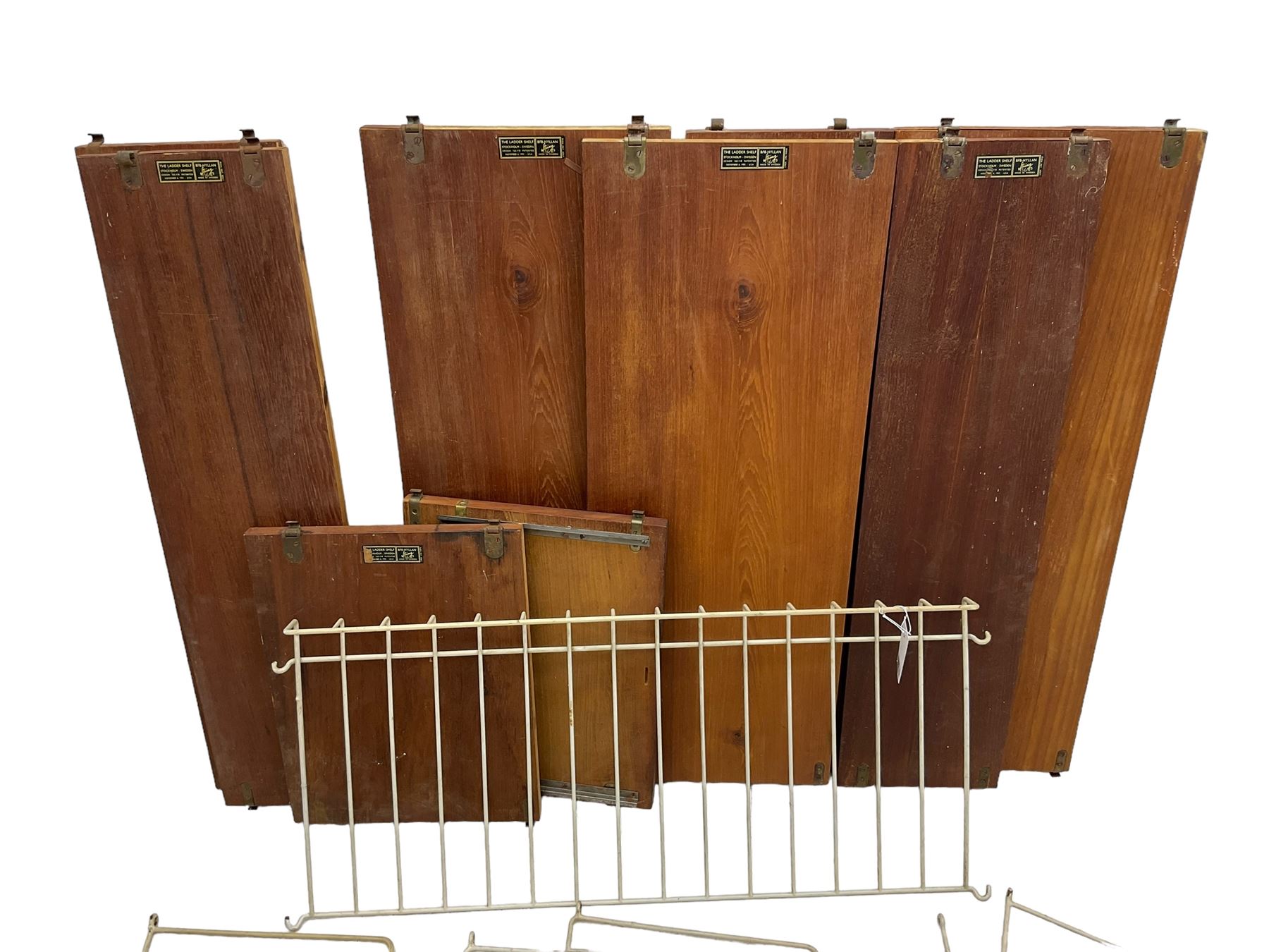 BFB-HYLLAN - collection of 'String' 1950s/60s teak wall shelving - four deep ladders (77cm x 28cm); two narrow ladders (78cm x 18cm); various shelves 