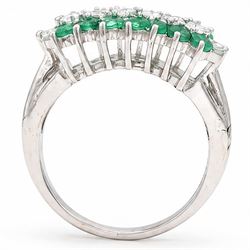 18ct white gold three row diamond and emerald ring, set with eight round brilliant cut diamonds and a row of seven emeralds set either side, total diamond weight approx 0.30 carat