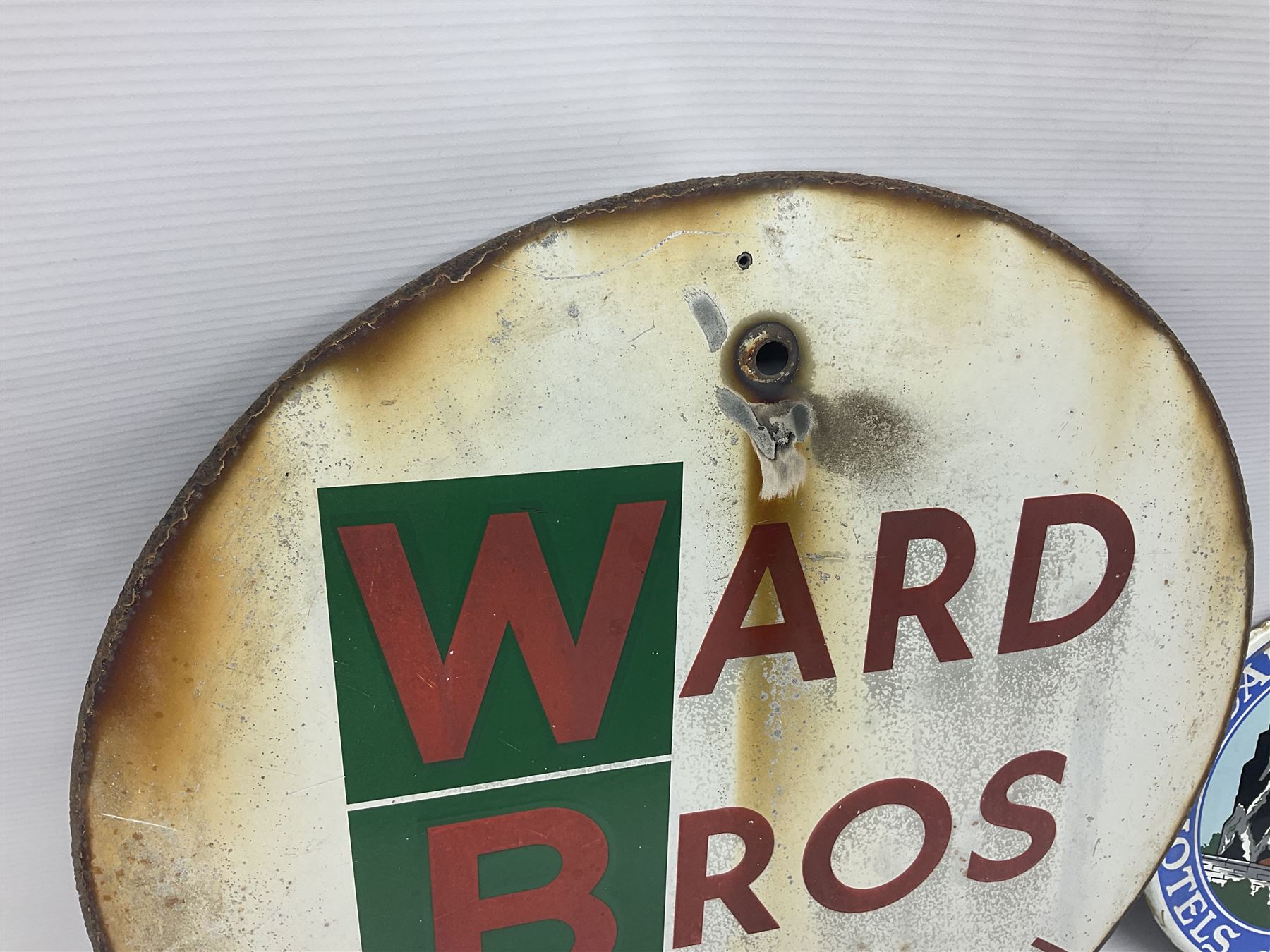 Ward Bros Sherburn Malton enamel sign, together with a Scarborough Hotels Association enamel sign, Malton sign D46cm 
