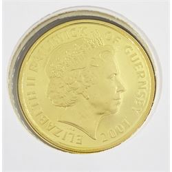 Queen Elizabeth II Bailiwick of Guernsey 2001 gold twenty-five pounds coin, housed in a commemorative cover