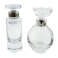 Shop stock: Silver mounted perfume bottle with flower head stopper and a similar bottle hallmarked