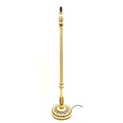 Late 20th century cream and gilt standard lamp, fluted stem on a circular base carved with leaves (H147cm)