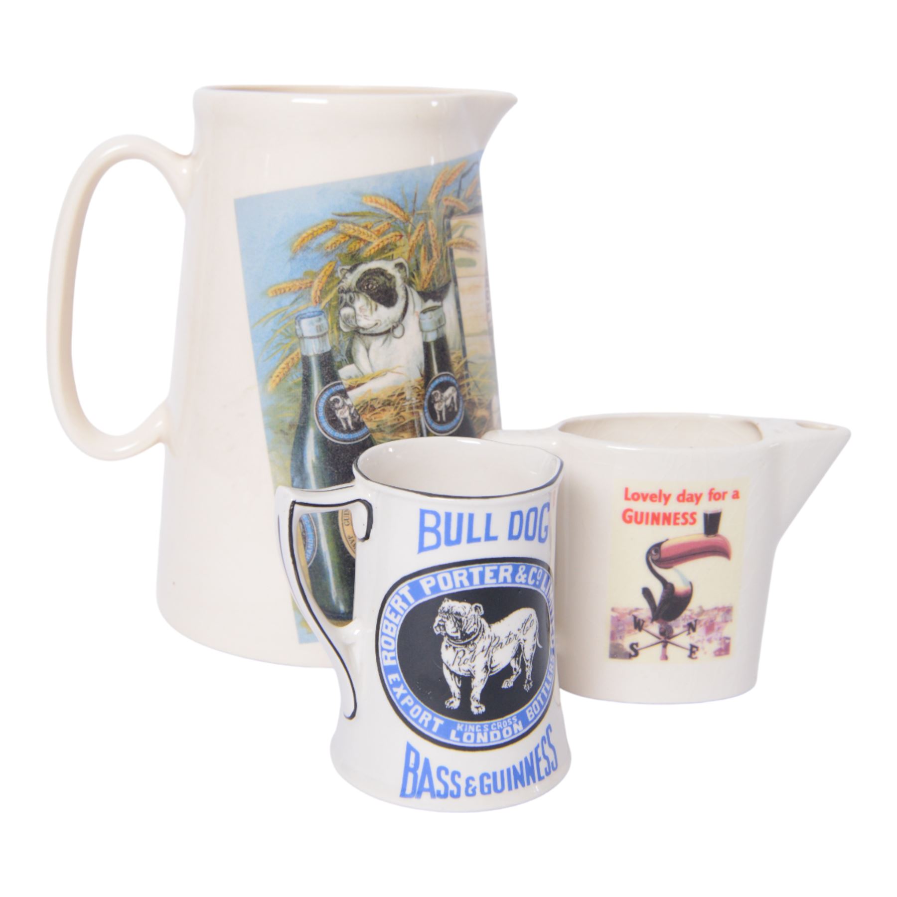 The Hill Church Potteries Bulldog Bass and Guinness Robert Porter & Co water jug, together with another Robert Porter and Co jug and Lovely Day for a Guinness jug, largest H23cm