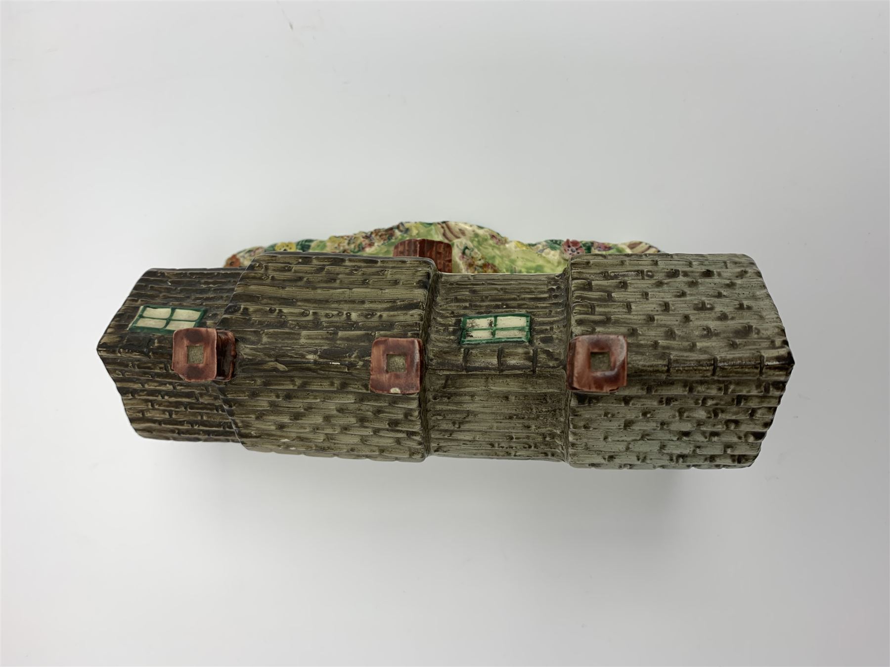 Leeds Pottery pastille burner modelled as two terrace cottages, with impressed mark beneath, H12cm L19cm